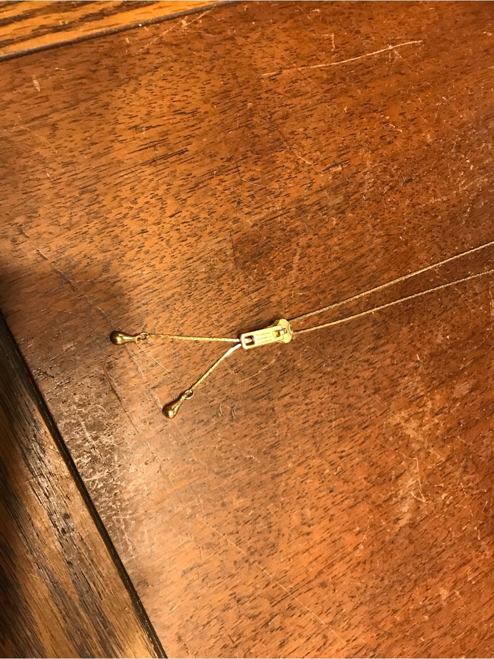 Shiny Gold-Tone Zipper Pendant Necklace with Slider Detail - Picture 6 of 6